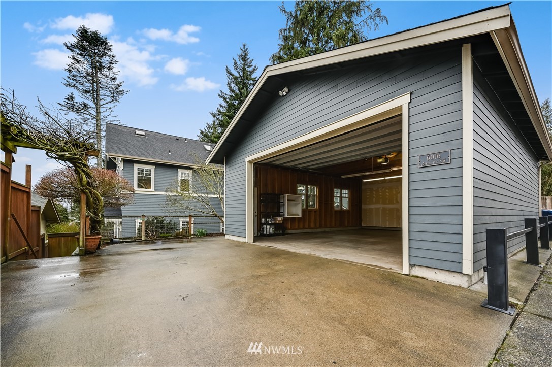 6016 44th Avenue Southwest Seattle, WA 98136 - Photo 32 of 35 a view of a house with a patio