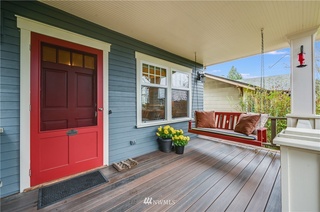 6016 44th Avenue Southwest Seattle, WA 98136 - Photo 5 of 35 a view of a deck with couches and wooden floor