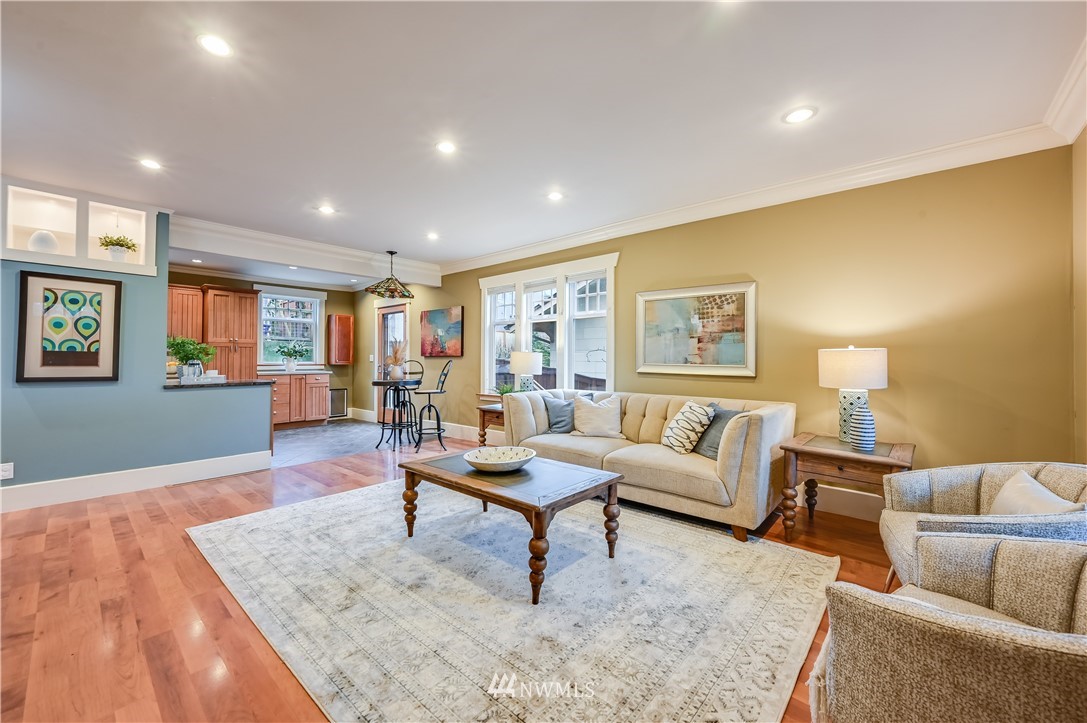 6016 44th Avenue Southwest Seattle, WA 98136 - Photo 6 of 35 a living room with furniture and a wooden floor