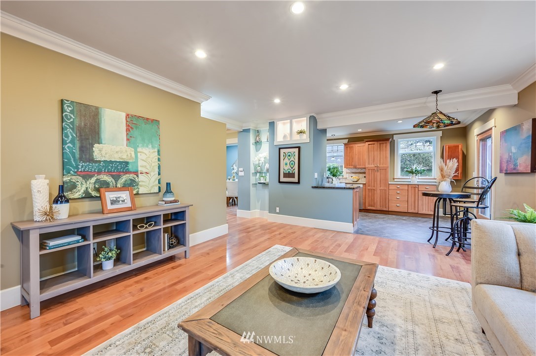 6016 44th Avenue Southwest Seattle, WA 98136 - Photo 7 of 35 a living room with furniture and a wooden floor