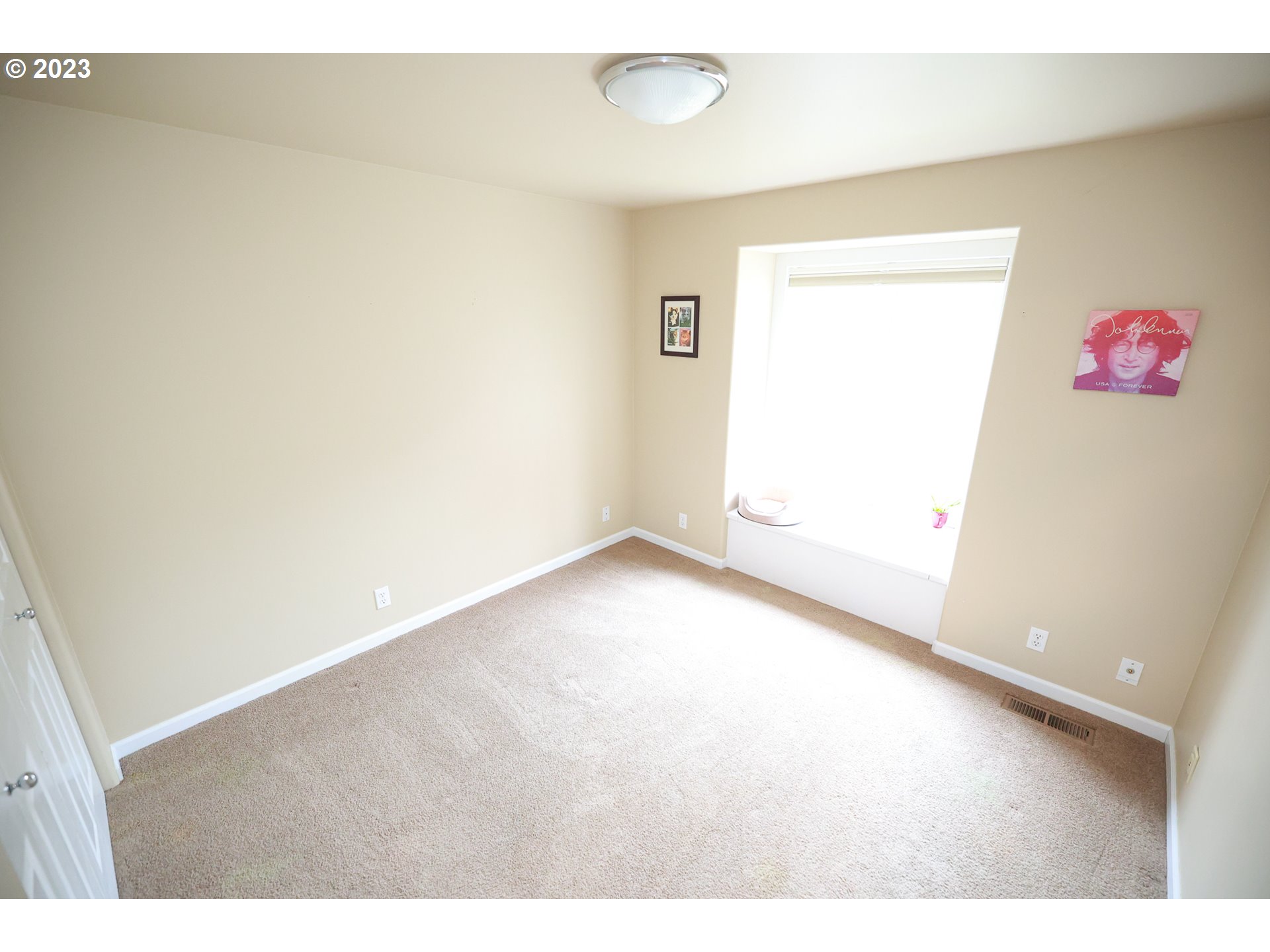 2465 South Bertelsen Road Eugene, OR 97405 - Photo 16 of 26 a view of an empty room and window