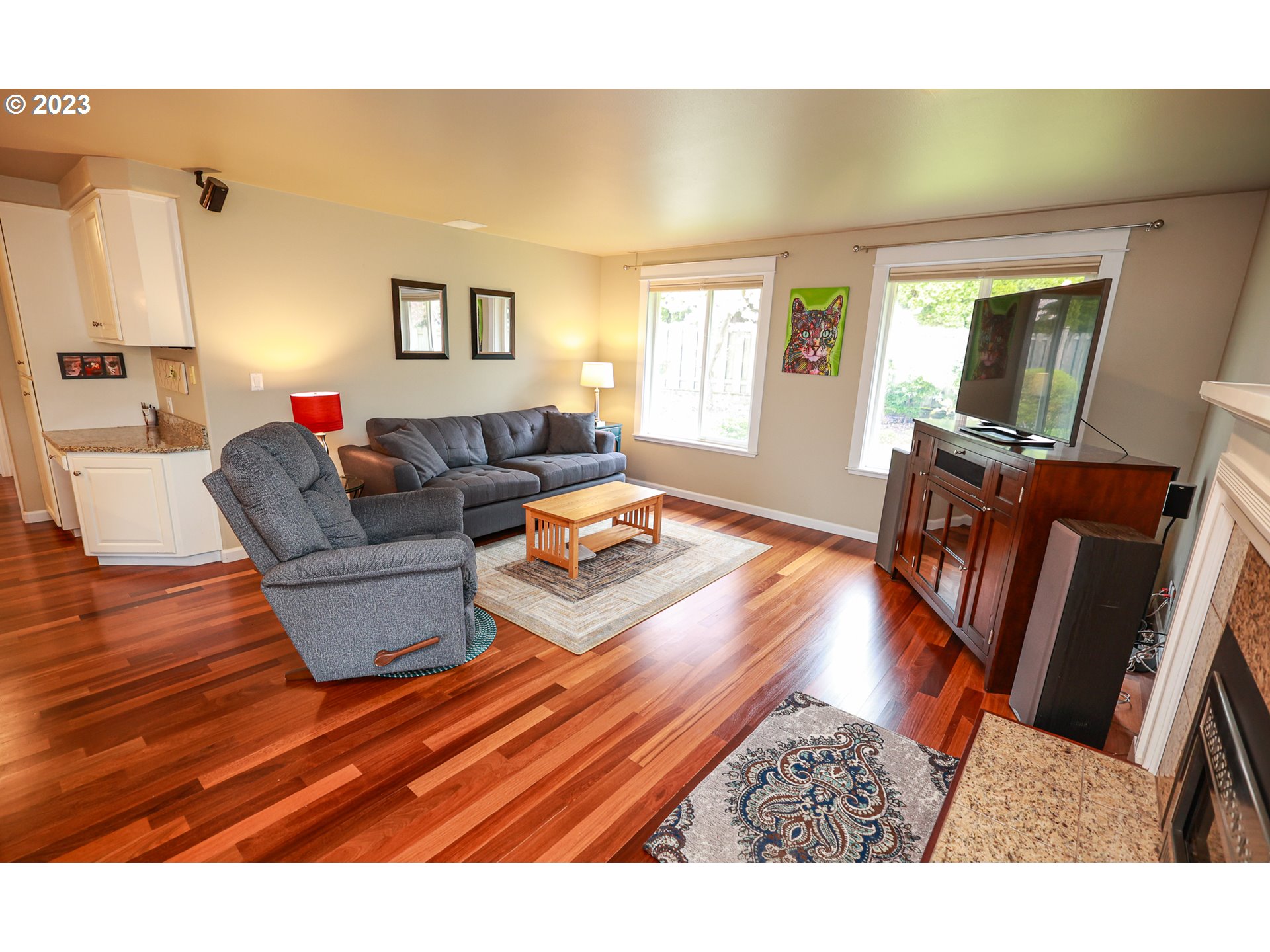 2465 South Bertelsen Road Eugene, OR 97405 - Photo 7 of 26 a living room with furniture and a flat screen tv