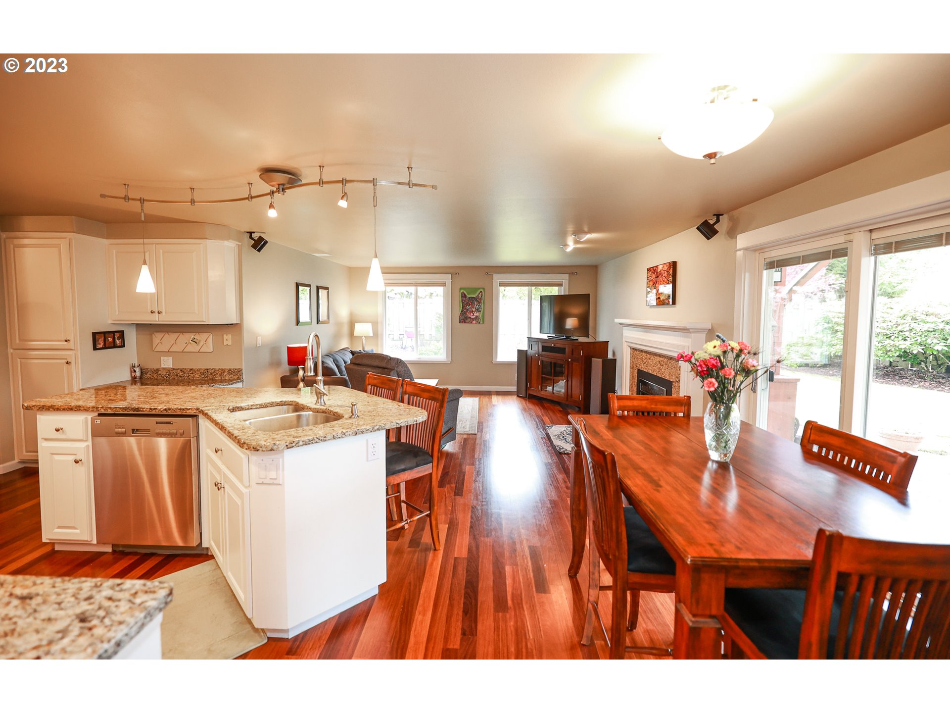 2465 South Bertelsen Road Eugene, OR 97405 - Photo 9 of 26 a open kitchen with stainless steel appliances granite countertop a stove and refrigerator