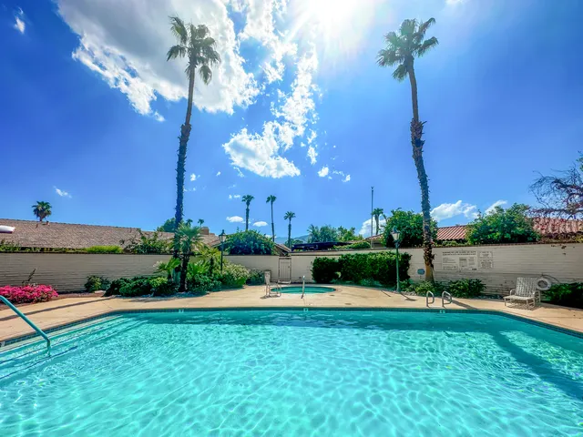 a view of a fountain in a yard