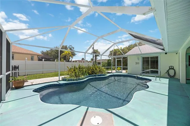 a view of a house with a swimming pool
