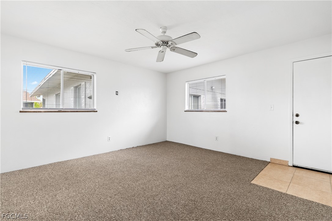 8141 Country Road, Unit 202 Fort Myers, FL 33919 - Photo 12 of 22 a view of an empty room with a window