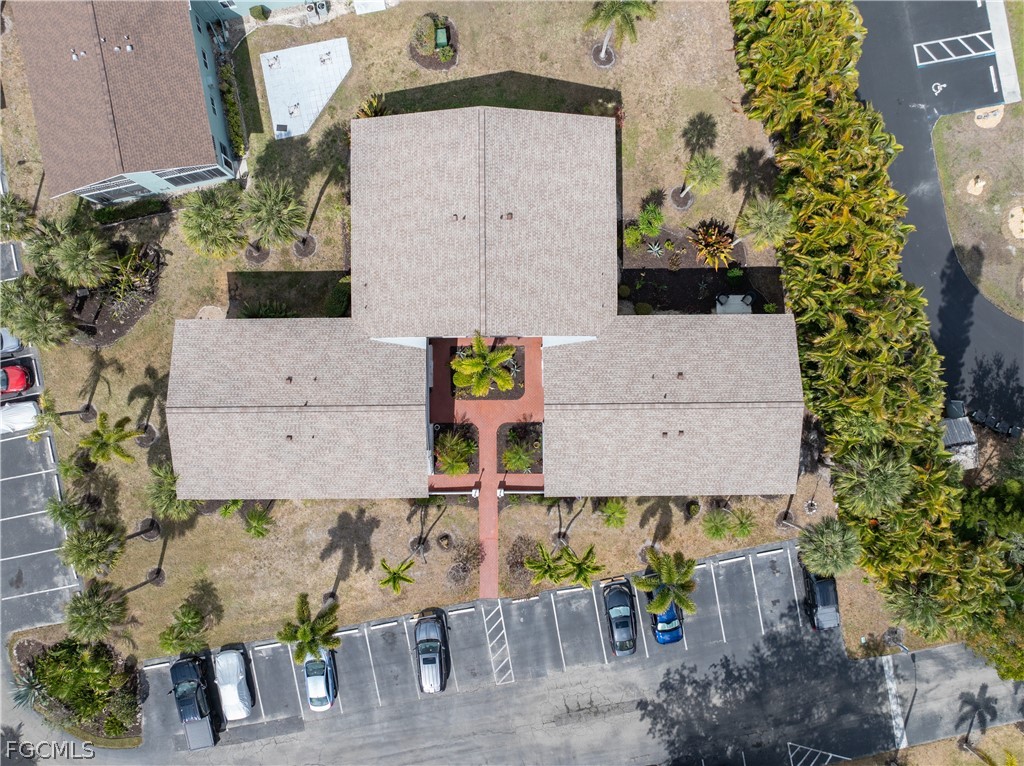 8141 Country Road, Unit 202 Fort Myers, FL 33919 - Photo 5 of 22 an aerial view of residential houses with outdoor space