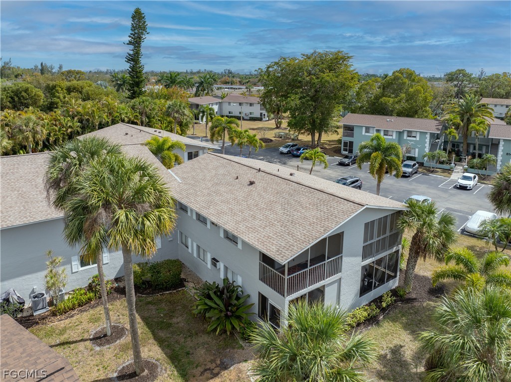 8141 Country Road, Unit 202 Fort Myers, FL 33919 - Photo 8 of 22 an aerial view of a house with swimming pool garden and patio