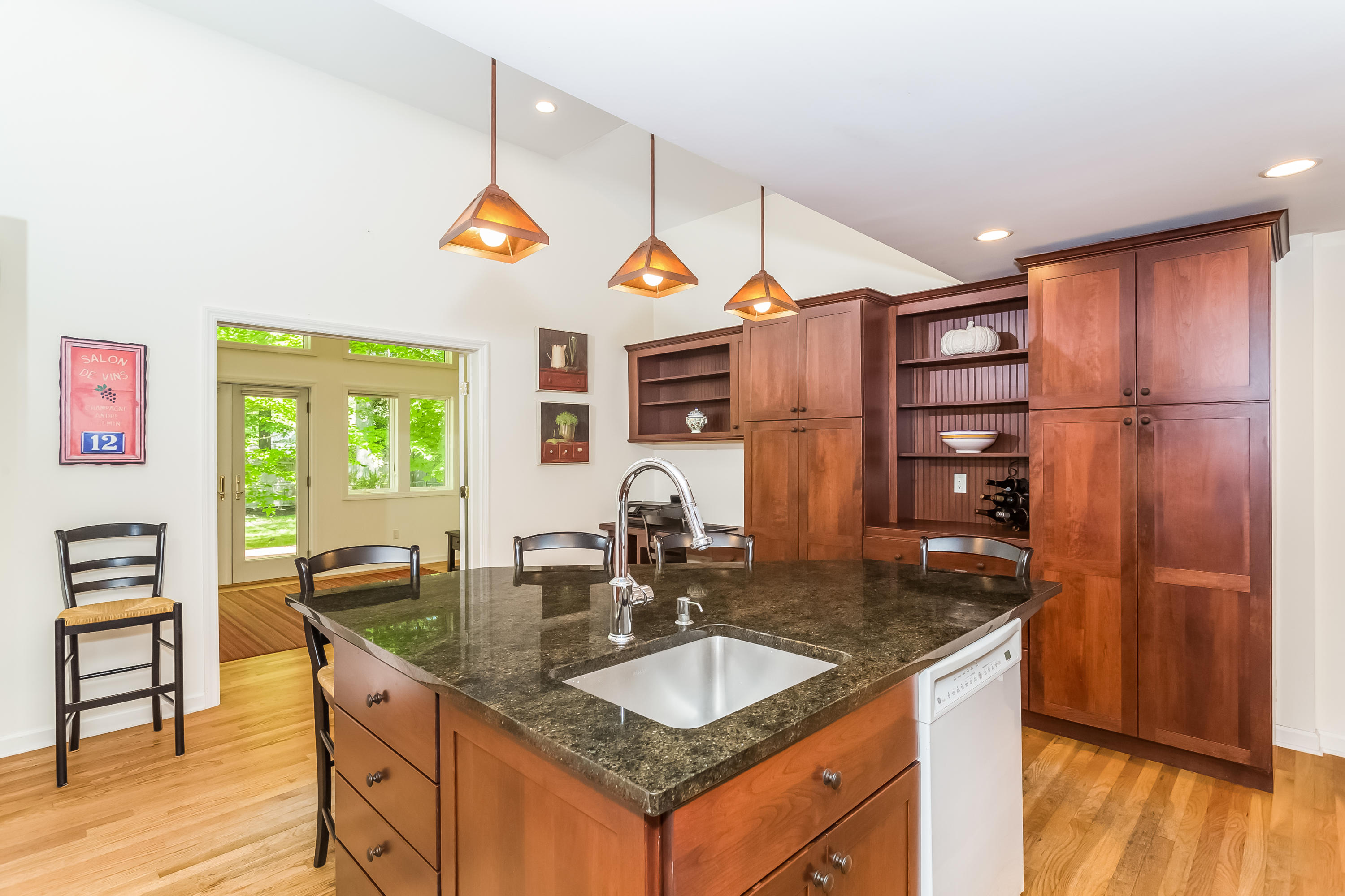 9 Little Brook Road Rowayton, CT 06853 - Photo 12 of 35 a kitchen with granite countertop a sink and a refrigerator