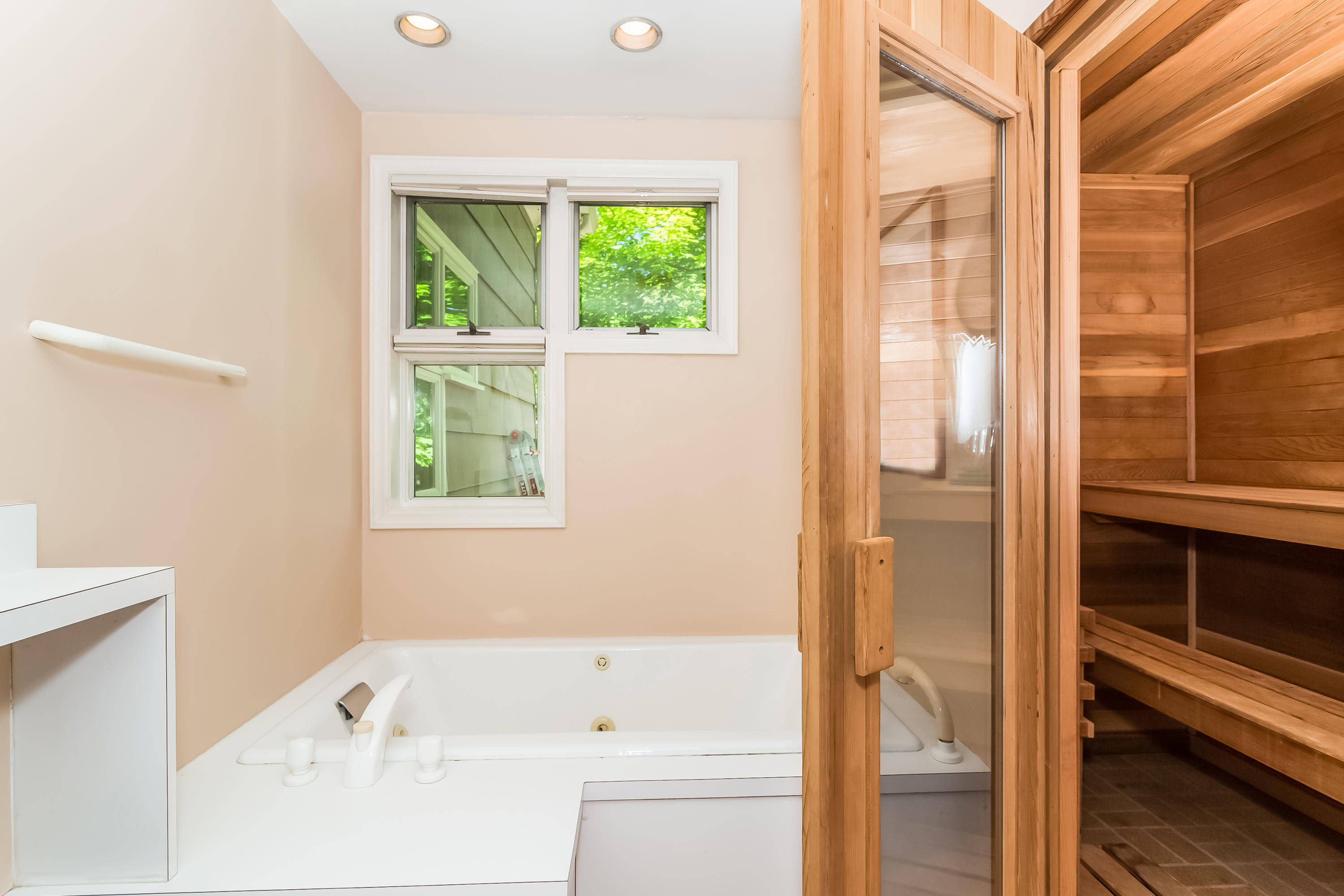9 Little Brook Road Rowayton, CT 06853 - Photo 21 of 35 a bathroom with a bathtub and a shower