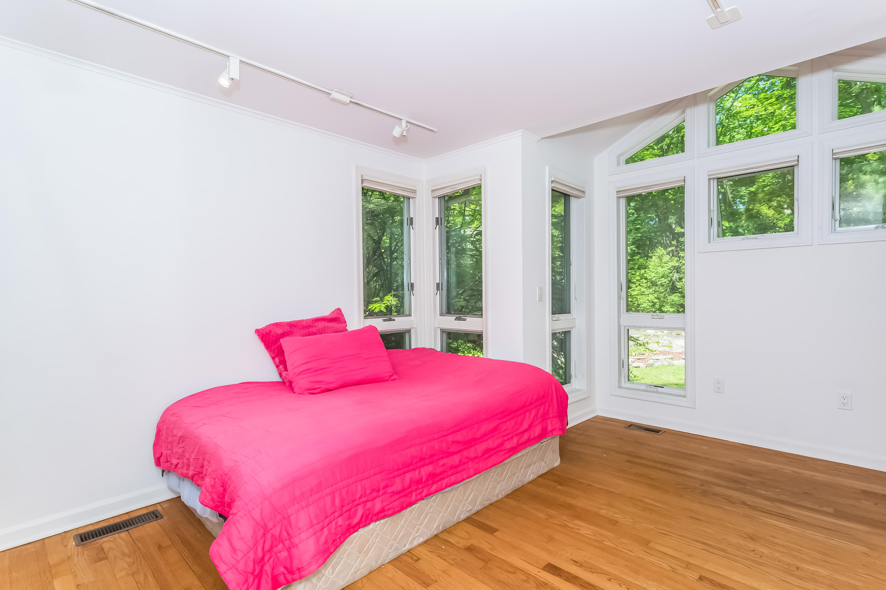 9 Little Brook Road Rowayton, CT 06853 - Photo 23 of 35 a bedroom with a bed and a window