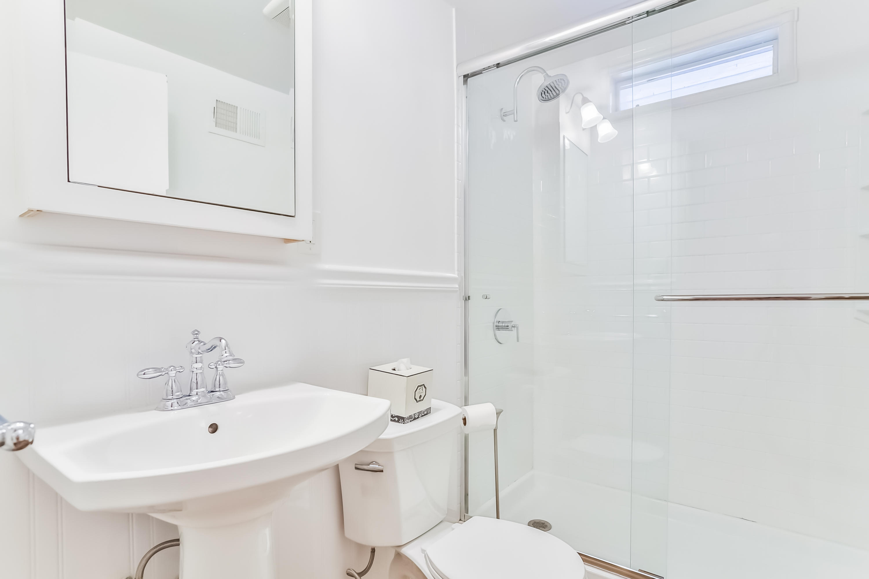 9 Little Brook Road Rowayton, CT 06853 - Photo 24 of 35 a bathroom with a sink a toilet and shower