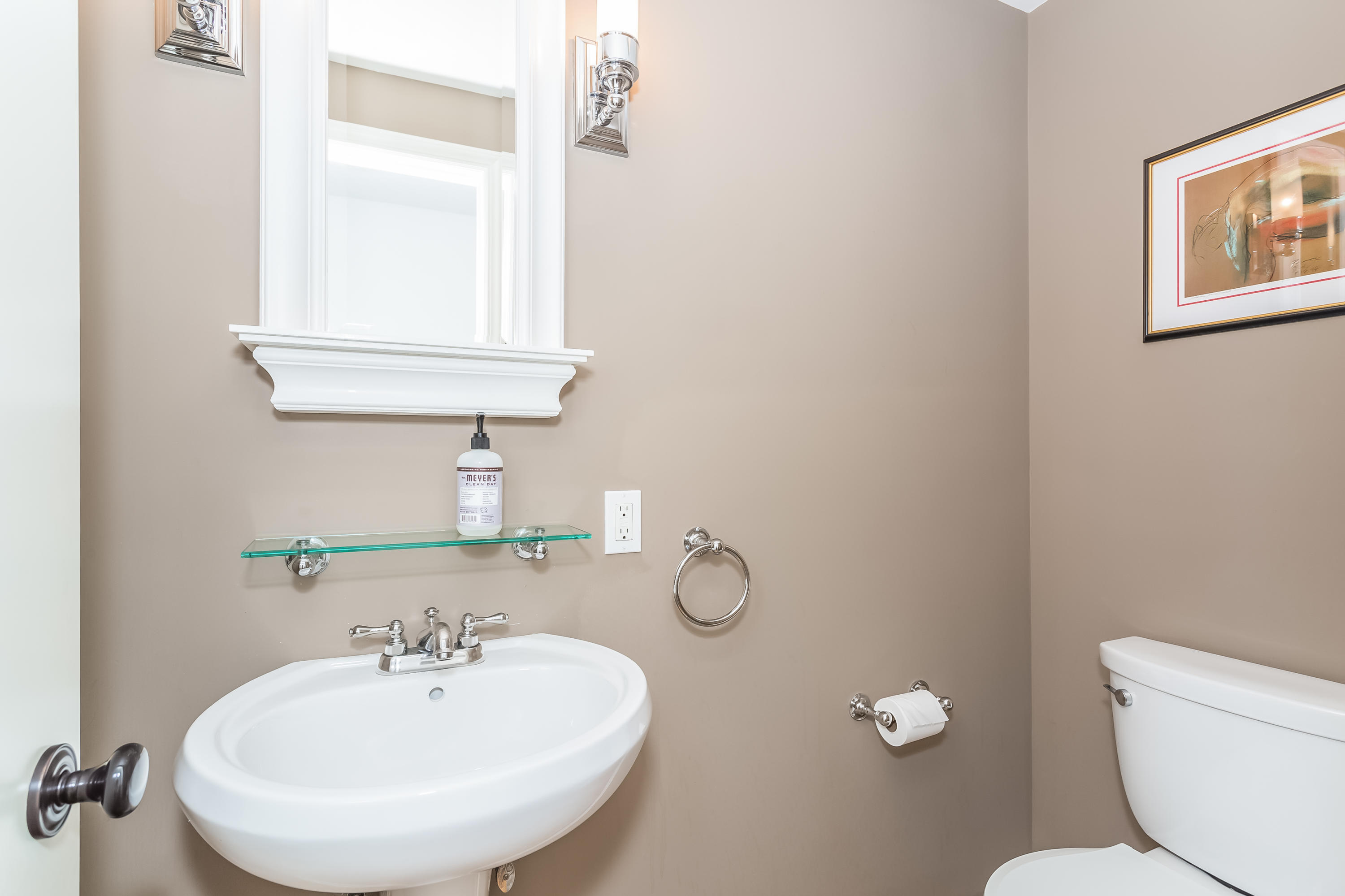 9 Little Brook Road Rowayton, CT 06853 - Photo 25 of 35 a bathroom with a toilet sink and mirror