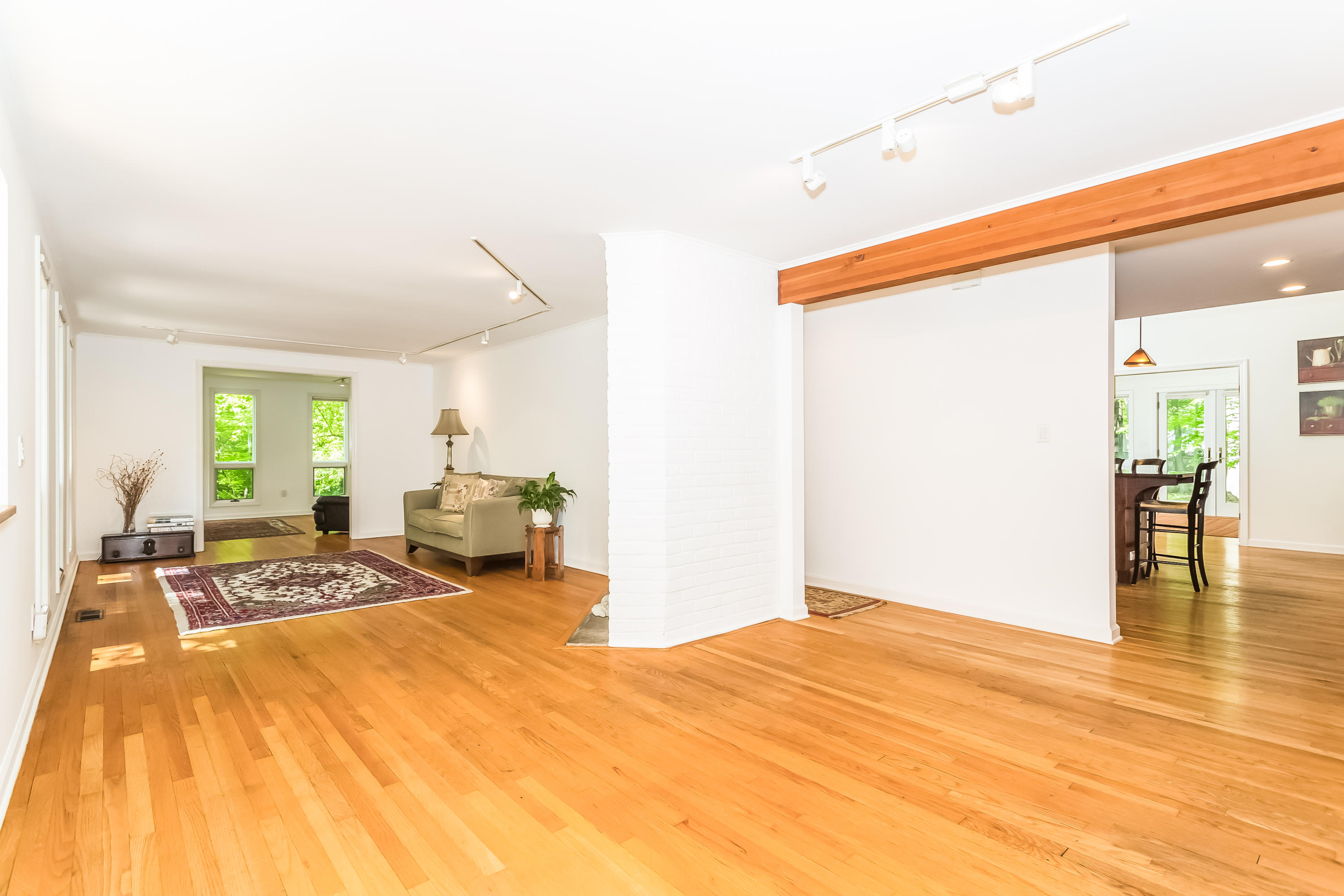 9 Little Brook Road Rowayton, CT 06853 - Photo 26 of 35 a bedroom with a bed and wooden floor