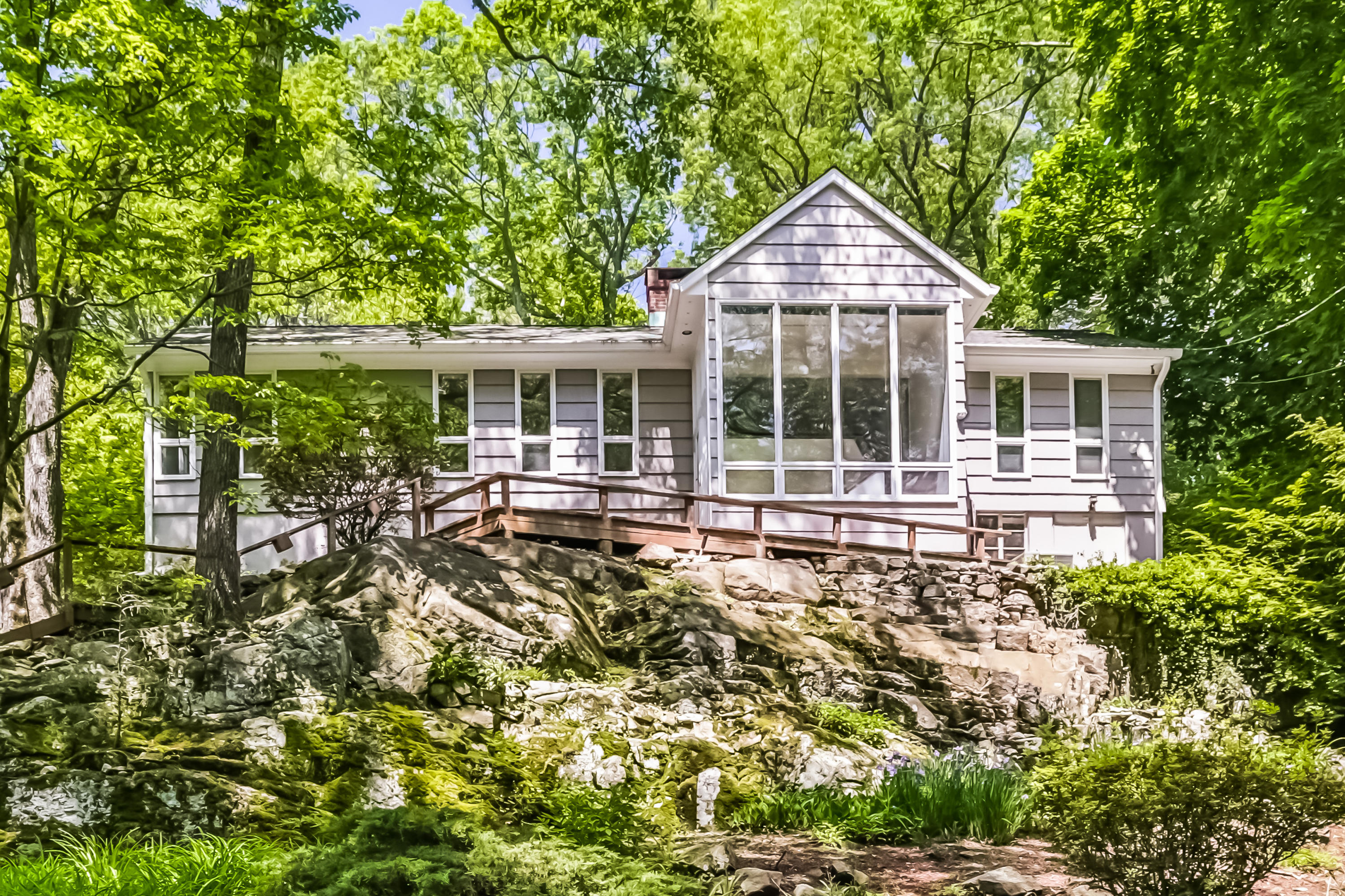 9 Little Brook Road Rowayton, CT 06853 - Photo 3 of 35 a house view with a garden space