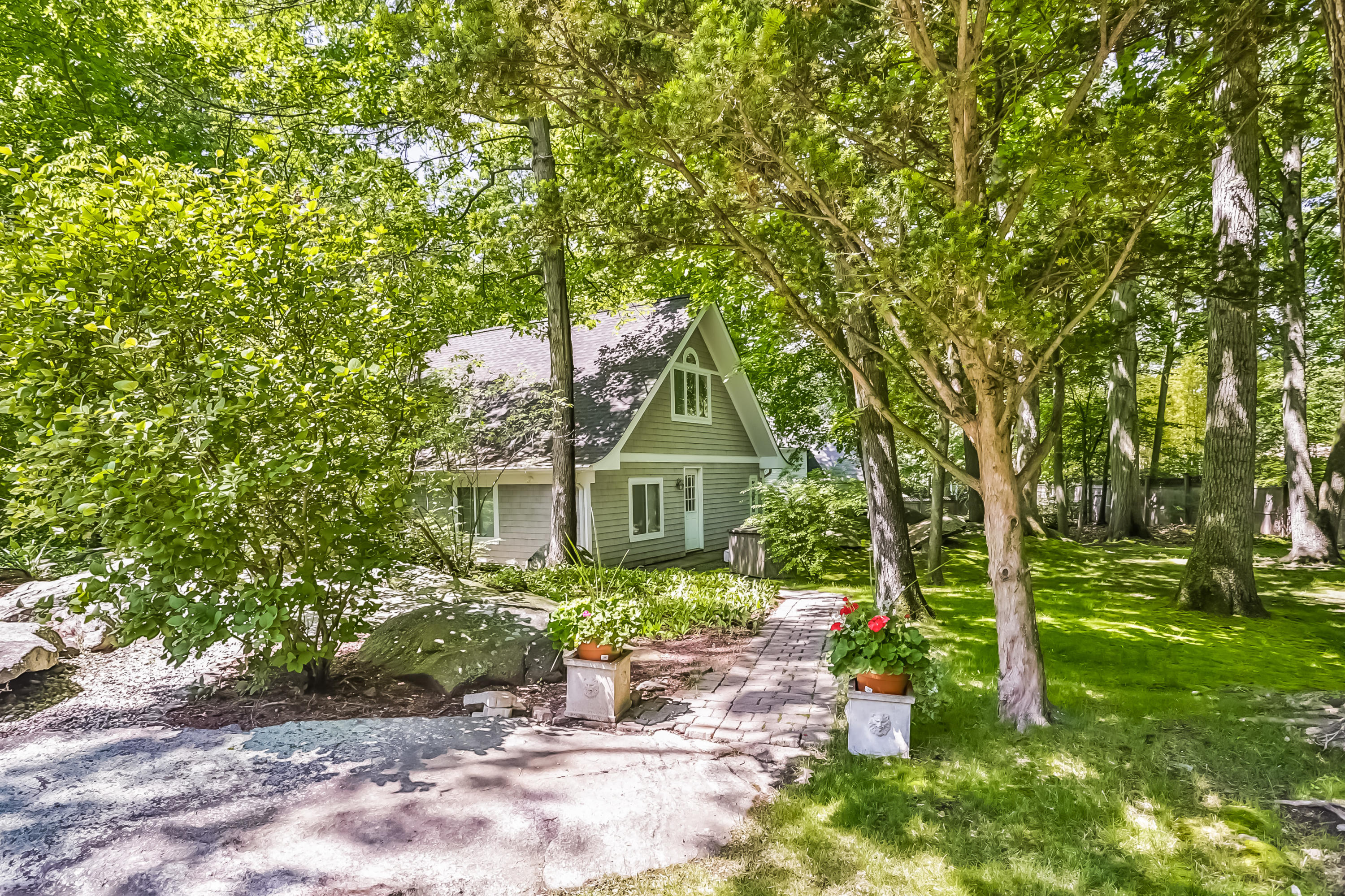 9 Little Brook Road Rowayton, CT 06853 - Photo 32 of 35 a backyard of a house with seating space