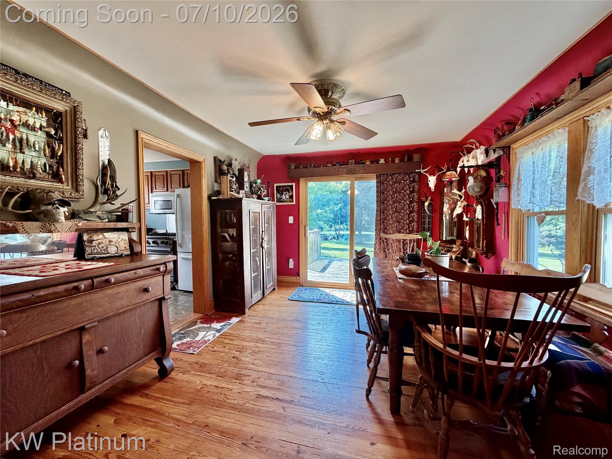 1581 Emerson Road Goodells, MI 48027 - Photo 8 of 45 Dining area featuring rich wood-finish flooring and a ceiling fan with integrated lighting