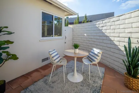 a table and chairs in a patio