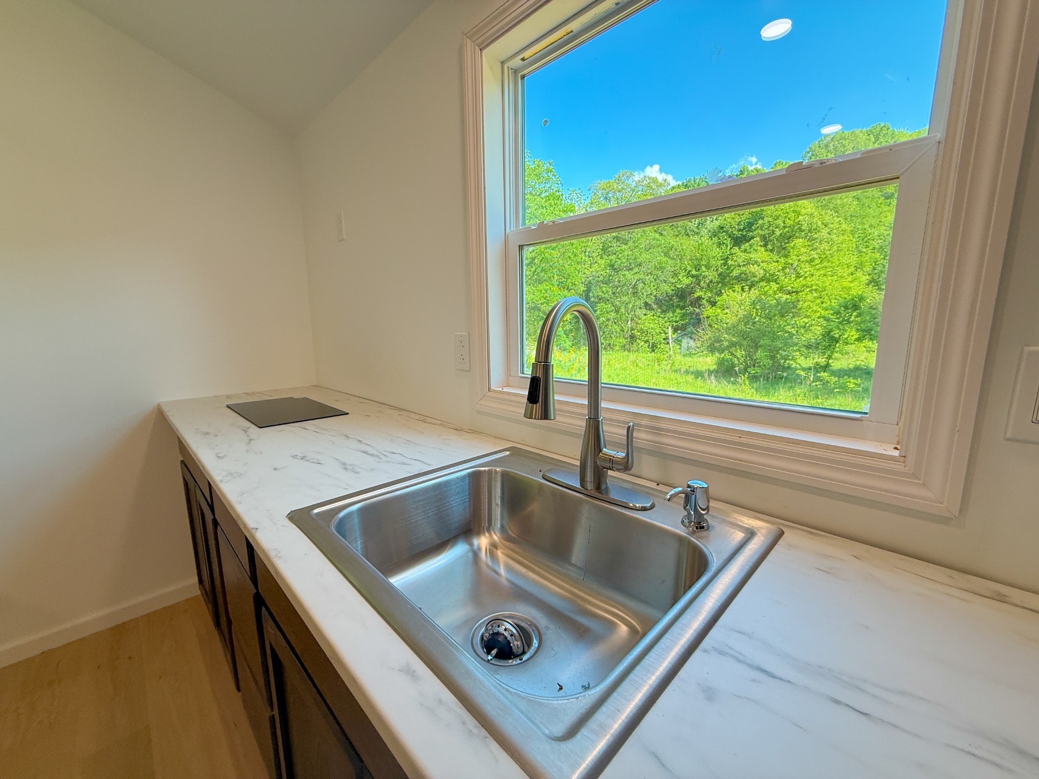 140 Ben Johnson Road Pulaski, TN 38478 - Photo 11 of 44 a sink sitting next to a window