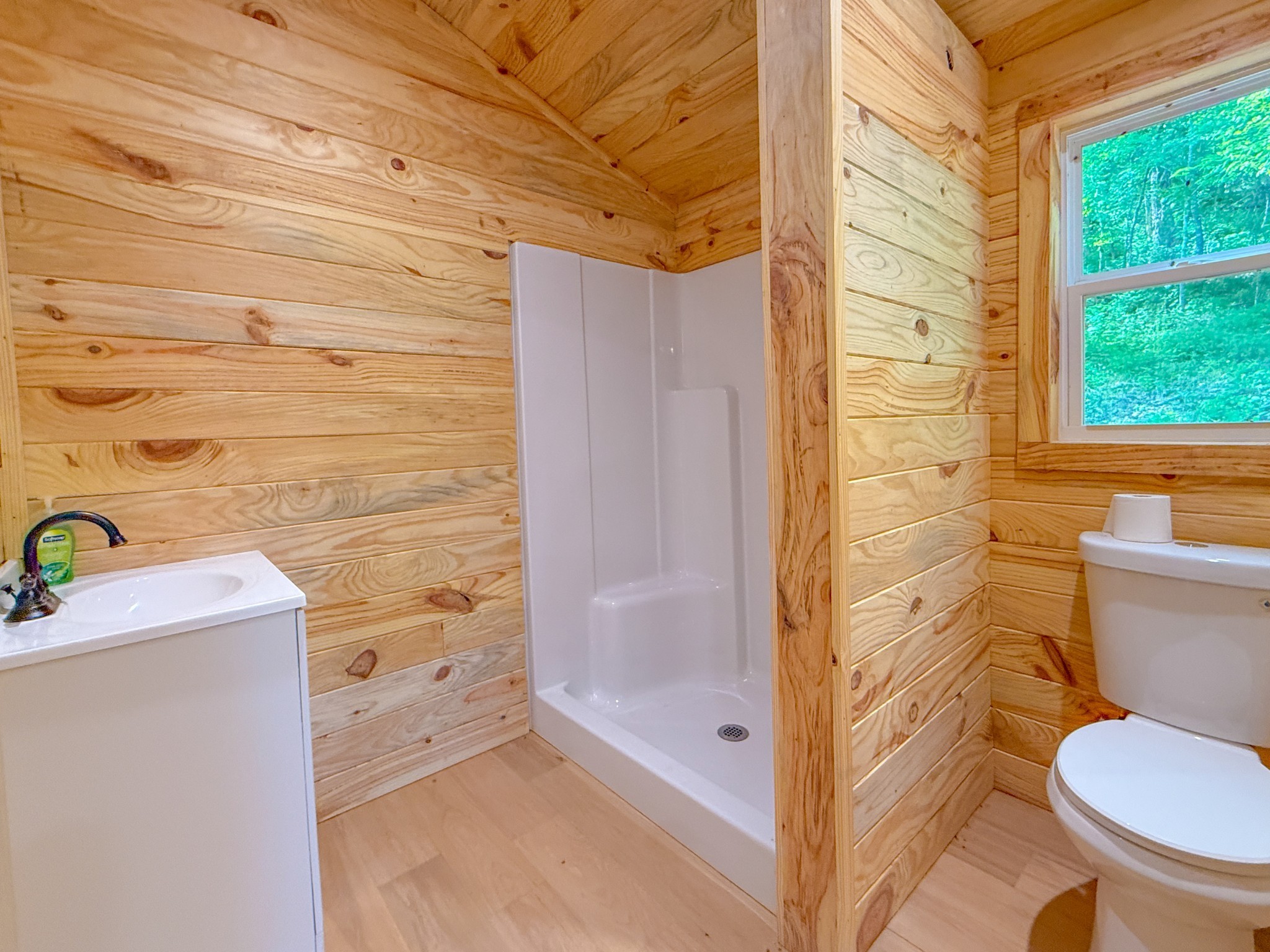 140 Ben Johnson Road Pulaski, TN 38478 - Photo 22 of 44 a bathroom with a toilet and a shower