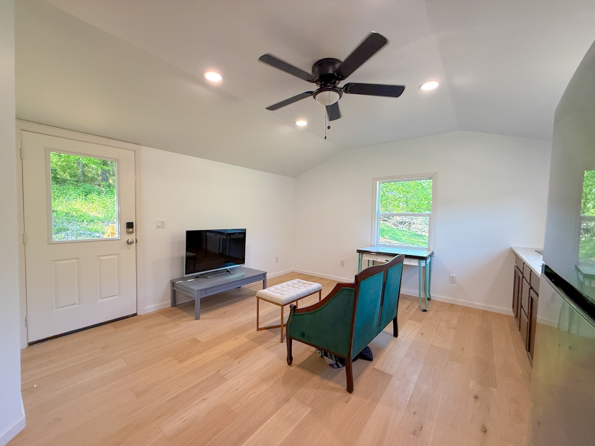 140 Ben Johnson Road Pulaski, TN 38478 - Photo 10 of 44 a living room with furniture and a flat screen tv