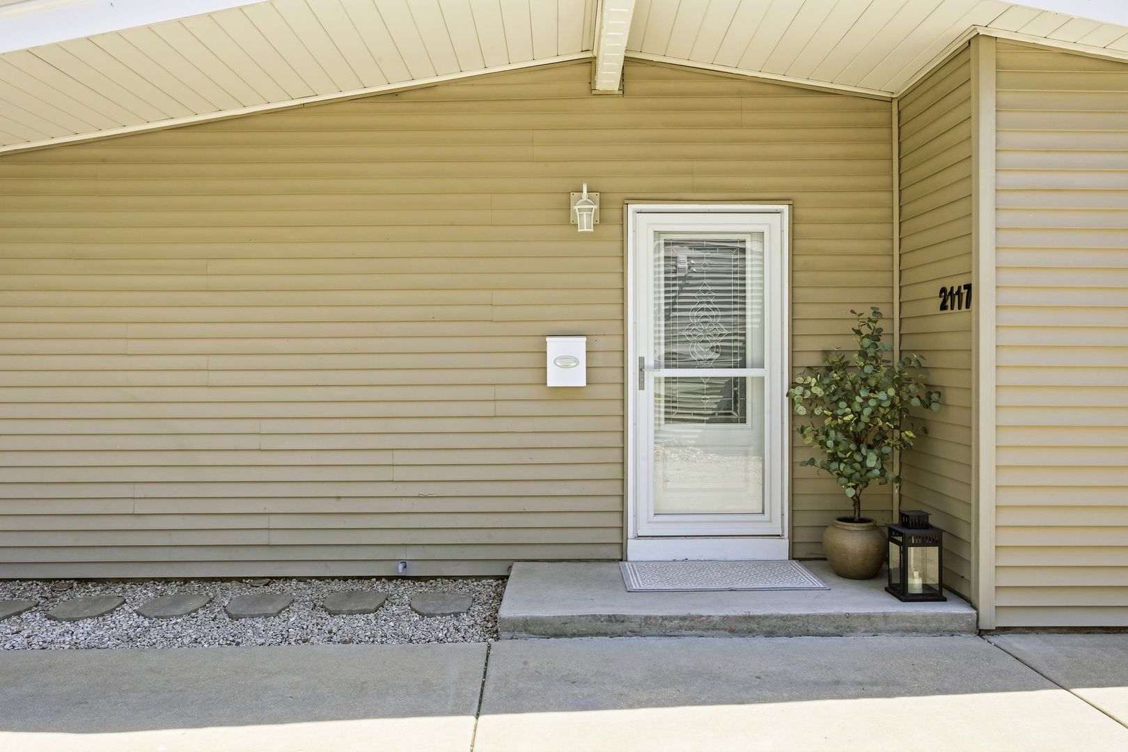 2117 Grouse Lane Rolling Meadows, IL 60008 - Photo 3 of 25 a view of a pathway besides a house