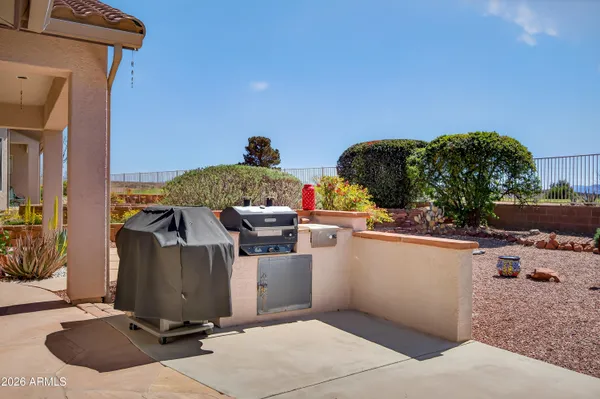 a view of a terrace with couches and potted plants