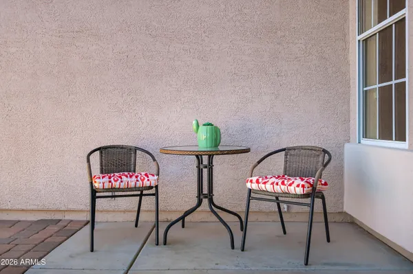 a view of a chairs and table in a kitchen