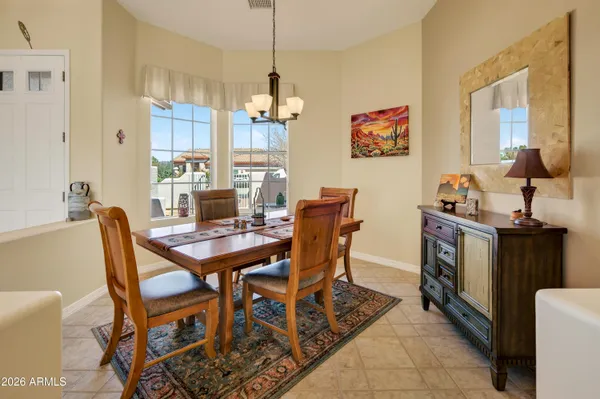 a view of a dining room with furniture