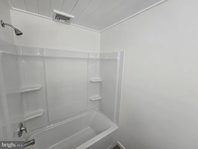 a close up of a bathtub