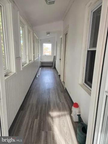 a view of livingroom with furniture and wooden floor