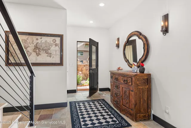 a view of a hallway with washer and dryer