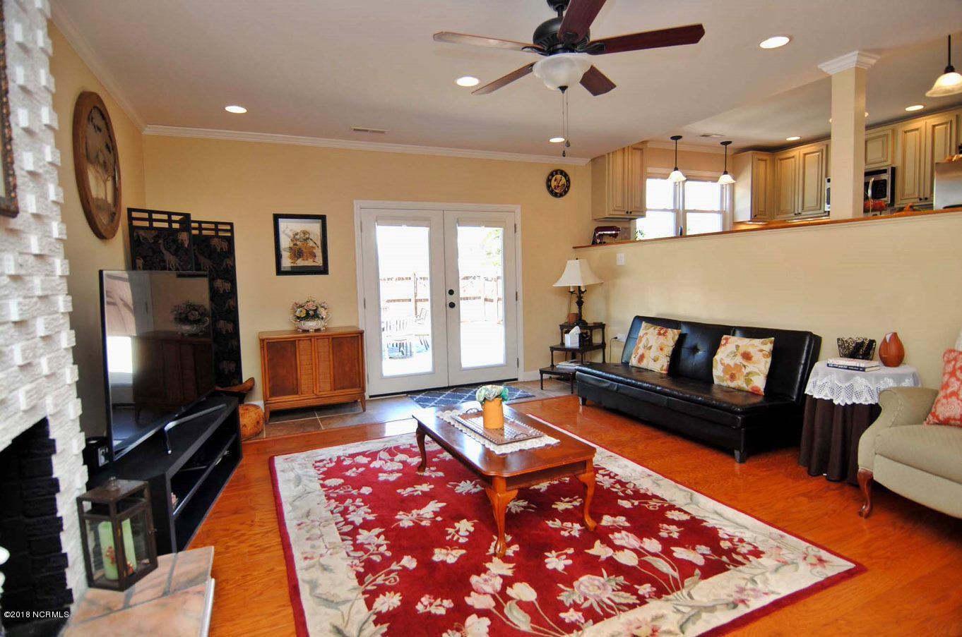 22 Partridge Road Wilmington, NC 28412 - Photo 9 of 30 Family Room opens to fabulous patio area