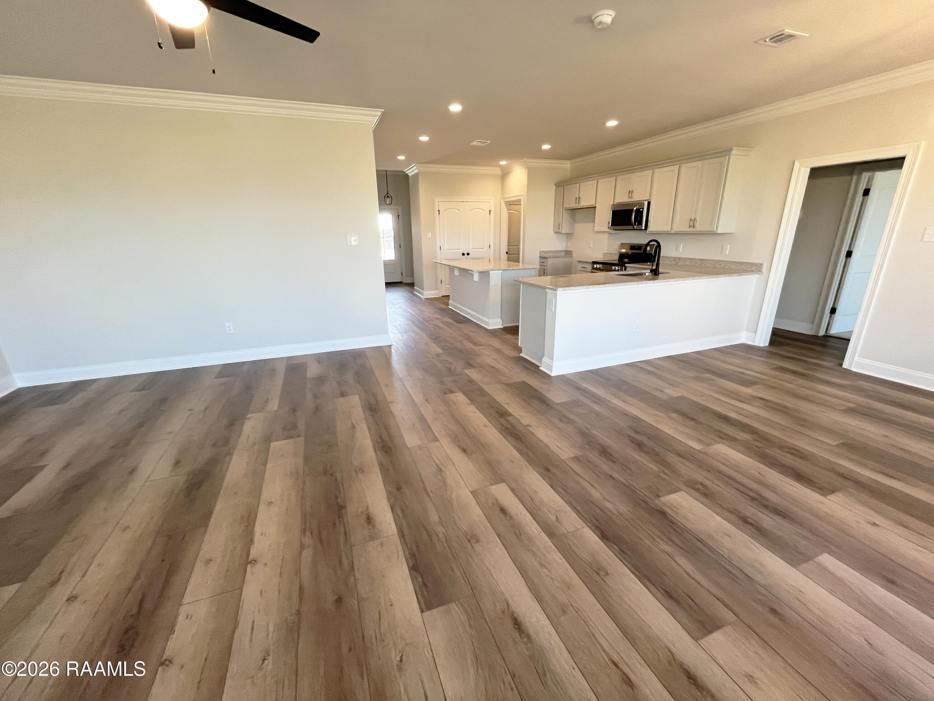 108 Mastermind Youngsville, LA 70592 - Photo 3 of 10 KITCHEN & LIVING ROOM