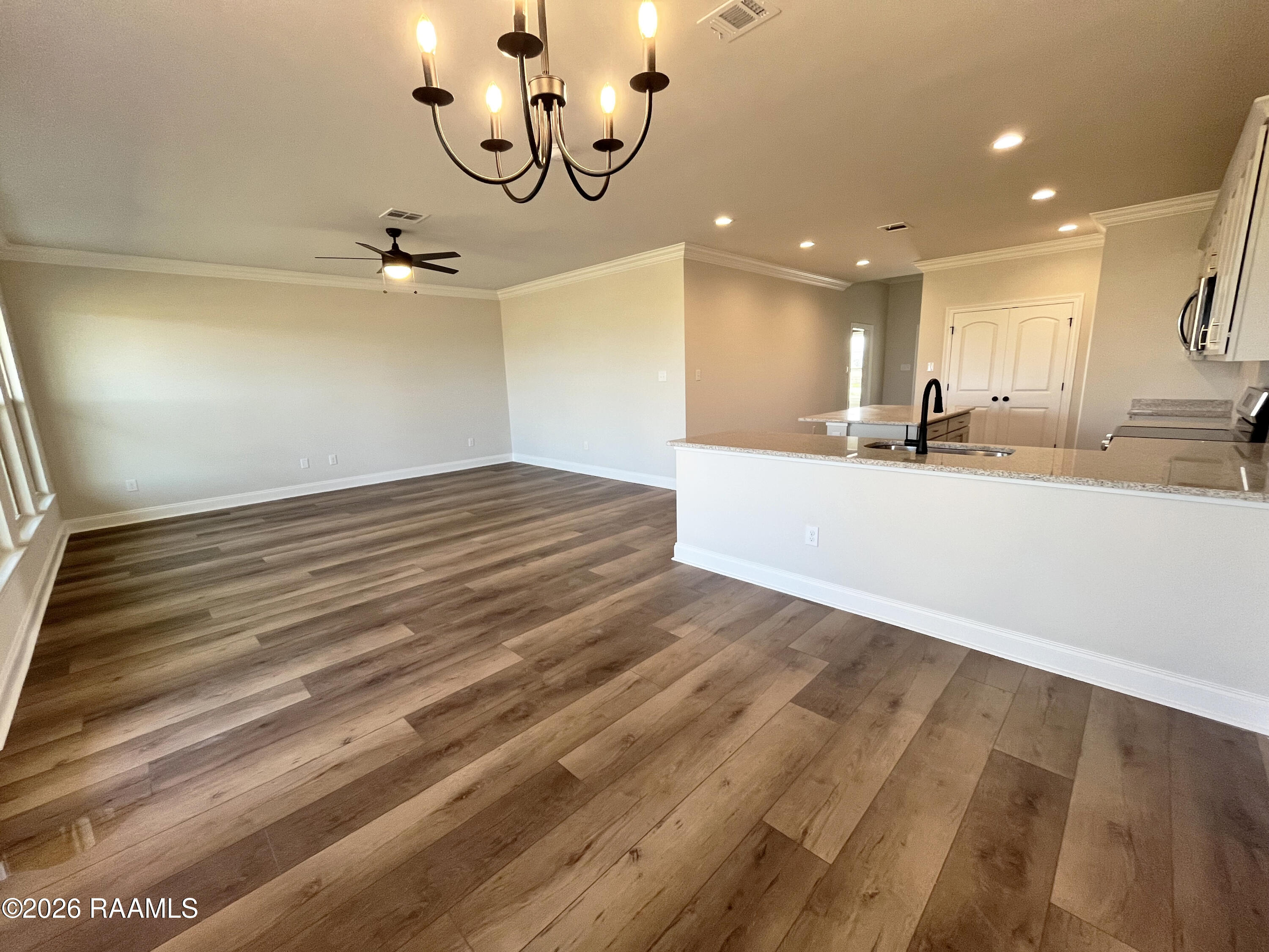 108 Mastermind Youngsville, LA 70592 - Photo 4 of 10 KITCHEN, DINING & LIVING ROOM