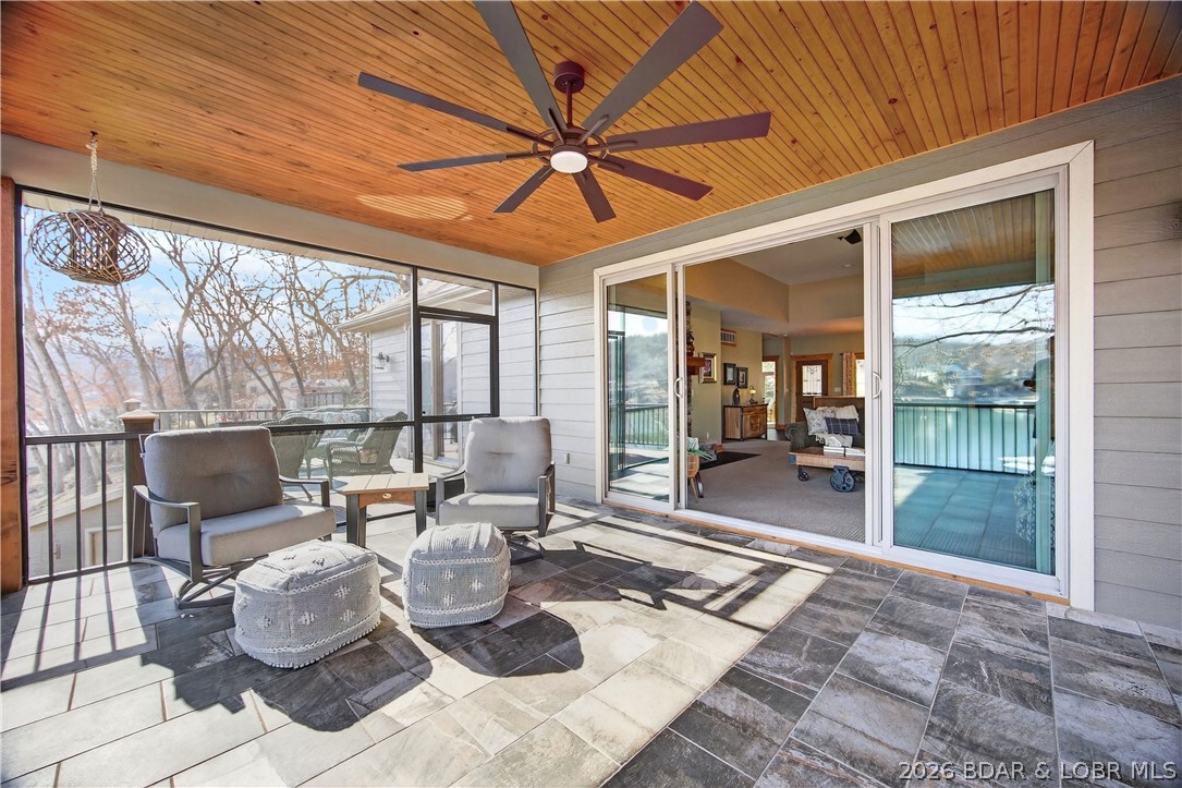 788 Pleasant Valley Drive Roach, MO 65787 - Photo 13 of 75 French sliders to bring the outdoors in.