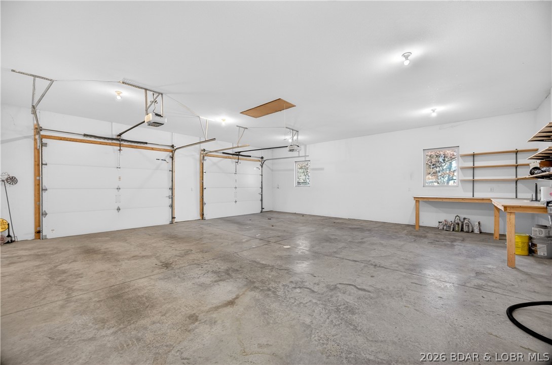 788 Pleasant Valley Drive Roach, MO 65787 - Photo 55 of 75 Climate controlled garage. 10ft doors 30X31
