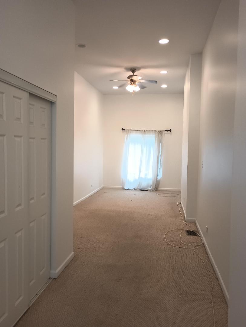 2236 West Monroe Street Chicago, IL 60612 - Photo 24 of 36 an empty room with windows and closet