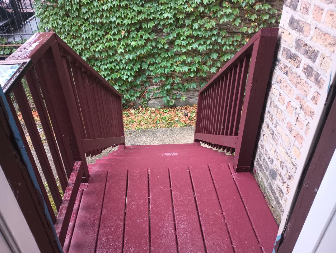 2236 West Monroe Street Chicago, IL 60612 - Photo 35 of 36 a balcony with wooden floor