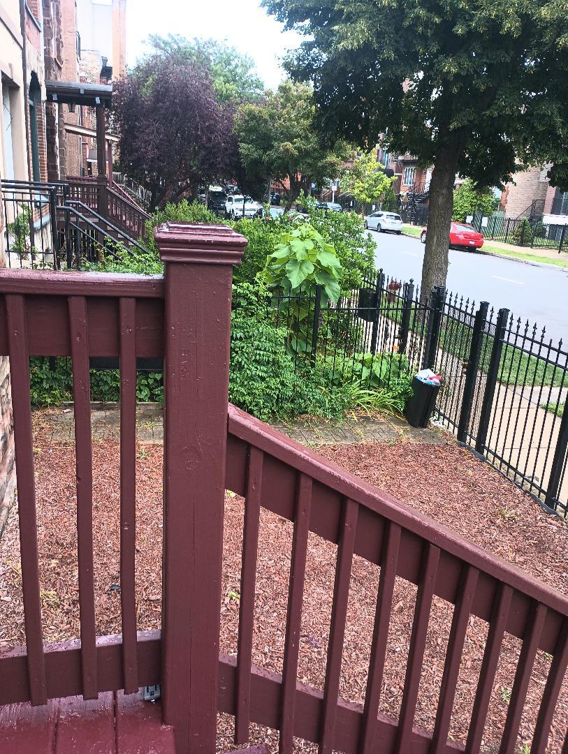 2236 West Monroe Street Chicago, IL 60612 - Photo 5 of 36 a view of a wooden fence from a balcony