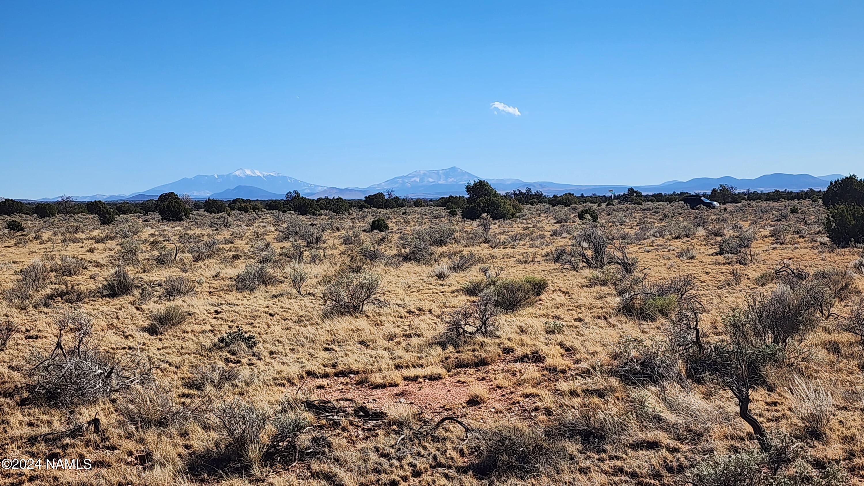 3433 Red Butte Road Williams, AZ 86046 - Photo 6 of 22 a view of a large body of water with a building in the background