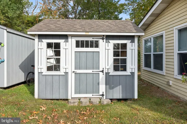 a house with yard in front of it