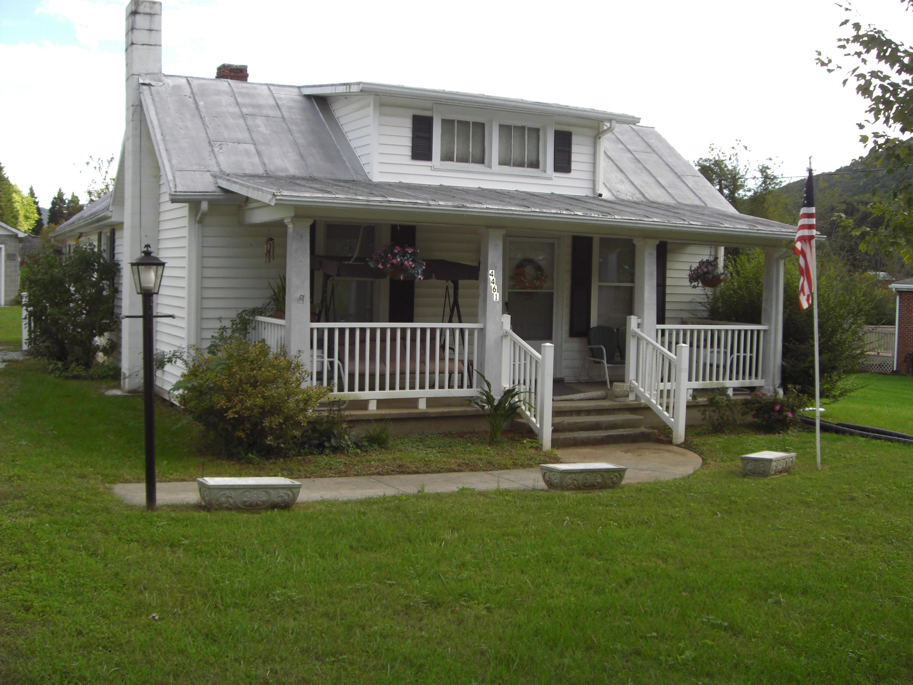 4461 Goodman Road Roanoke, VA 24014 - Photo 1 of 18 Rocking Chair Front Porch