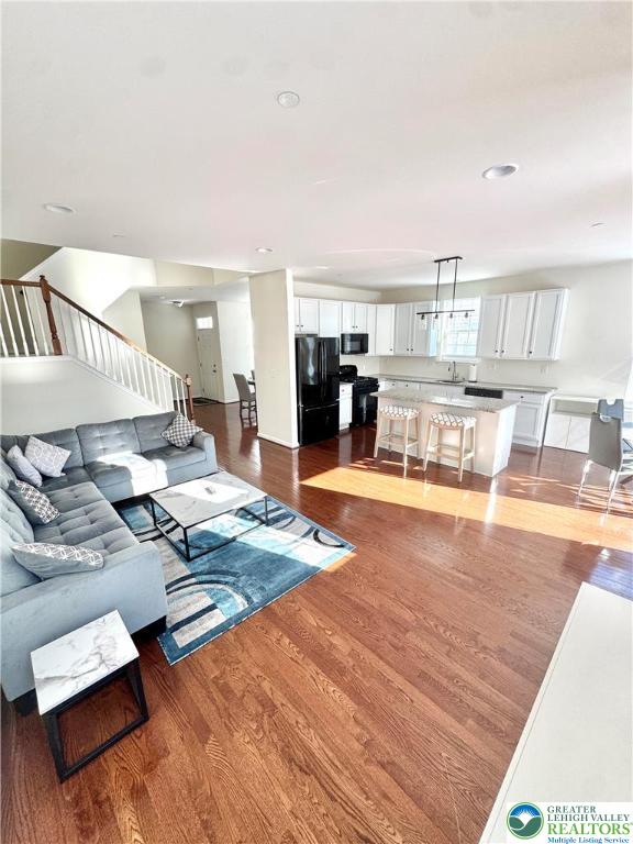 370 Redclover Lane Allentown, PA 18104 - Photo 8 of 33 a living room with furniture and wooden floor