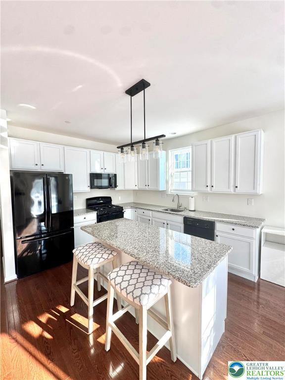 370 Redclover Lane Allentown, PA 18104 - Photo 9 of 33 a kitchen with kitchen island granite countertop a stove a sink and a refrigerator