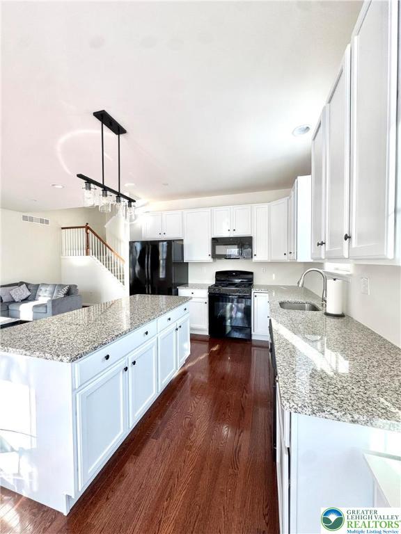 370 Redclover Lane Allentown, PA 18104 - Photo 10 of 33 a kitchen with stainless steel appliances granite countertop a sink and cabinets