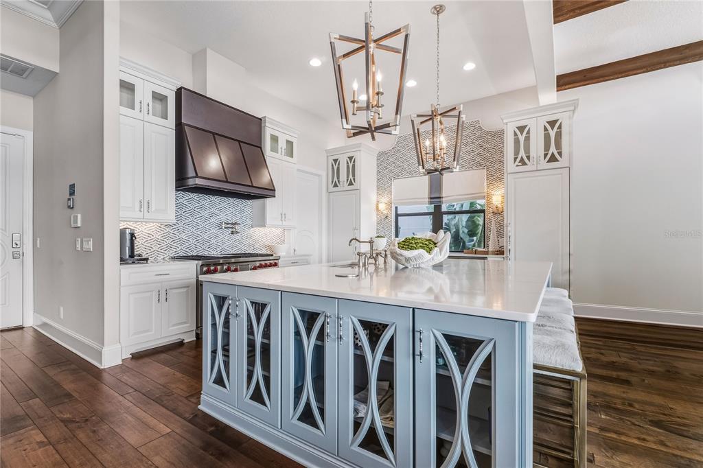 459 20th Avenue Indian Rocks Beach, FL 33785 - Photo 21 of 70 a kitchen with stainless steel appliances granite countertop a sink and a microwave