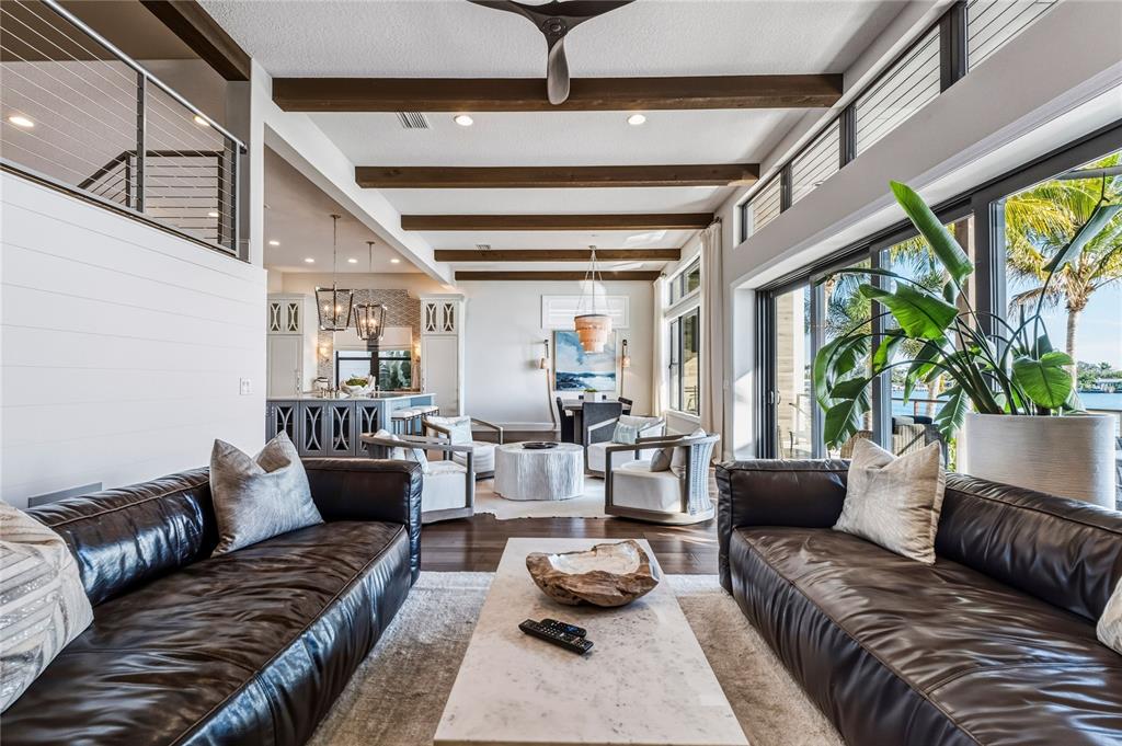 459 20th Avenue Indian Rocks Beach, FL 33785 - Photo 26 of 70 a living room with furniture and a large window