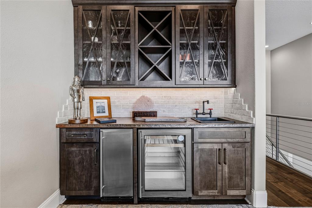 459 20th Avenue Indian Rocks Beach, FL 33785 - Photo 34 of 70 a kitchen with a stove and a sink