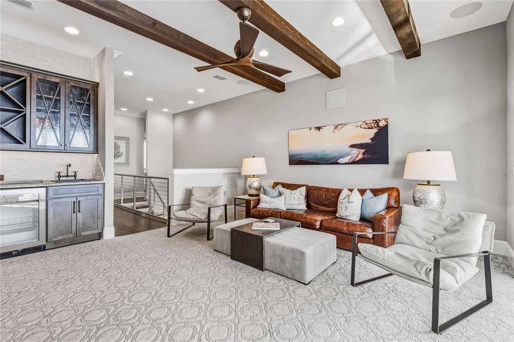 459 20th Avenue Indian Rocks Beach, FL 33785 - Photo 35 of 70 a living room with furniture and a kitchen